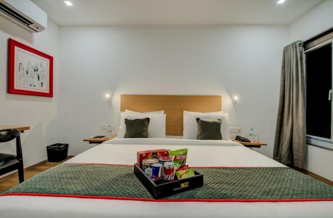 Hotel Town Plaza Púna Kültér fotó