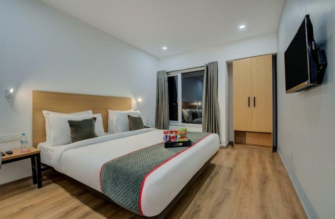Hotel Town Plaza Púna Kültér fotó