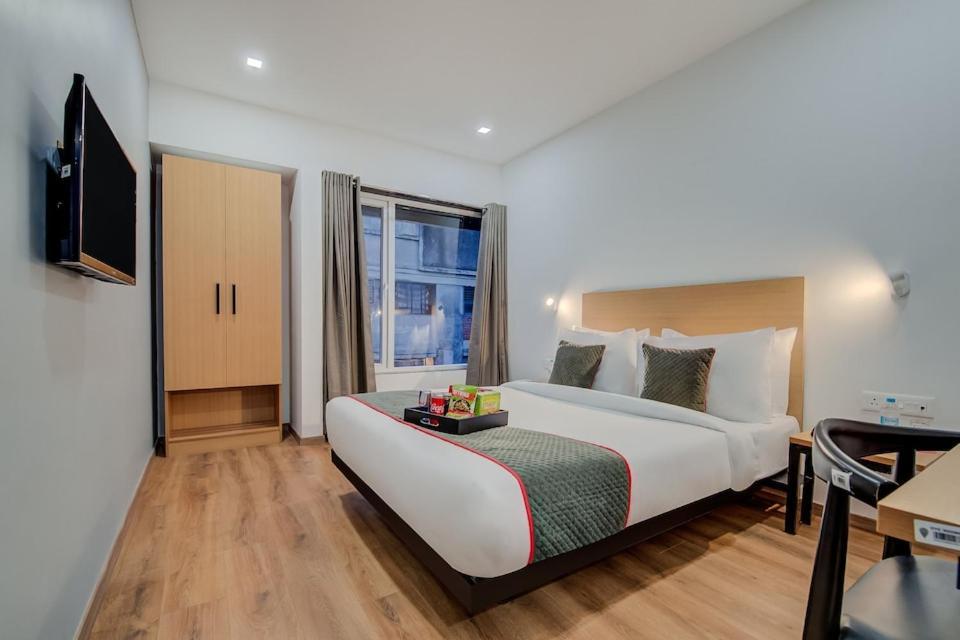 Hotel Town Plaza Púna Kültér fotó