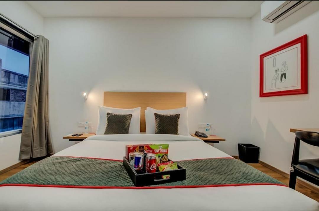 Hotel Town Plaza Púna Kültér fotó