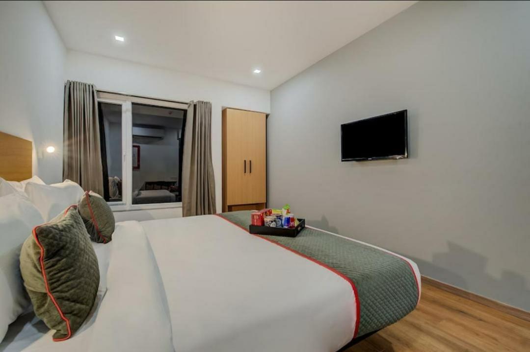 Hotel Town Plaza Púna Kültér fotó